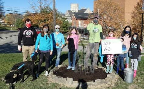 Group photo of W&J community members with a new tree