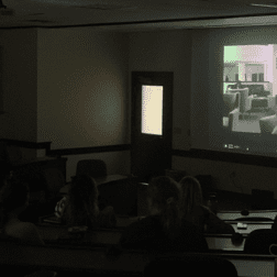 Recent W&J alumna Rosa Messersmith premiers first films with a projector in a classroom.